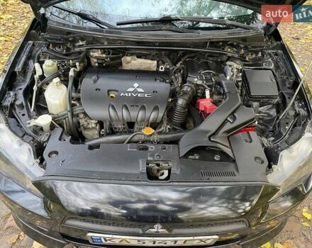 Чорний Міцубісі Lancer, об'ємом двигуна 2 л та пробігом 237 тис. км за 7500 $, фото 18 на Automoto.ua