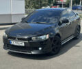 Черный Мицубиси Лансер, объемом двигателя 2 л и пробегом 295 тыс. км за 7000 $, фото 1 на Automoto.ua