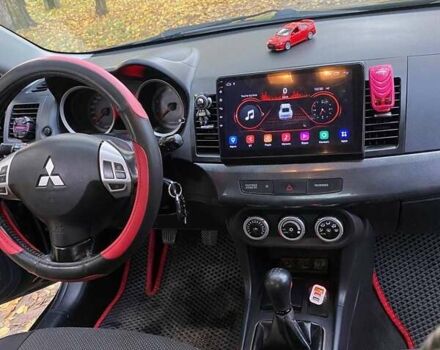 Чорний Міцубісі Lancer, об'ємом двигуна 2 л та пробігом 237 тис. км за 7500 $, фото 20 на Automoto.ua