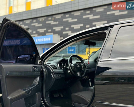 Черный Мицубиси Лансер, объемом двигателя 2 л и пробегом 236 тыс. км за 7950 $, фото 5 на Automoto.ua