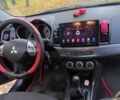 Чорний Міцубісі Lancer, об'ємом двигуна 2 л та пробігом 237 тис. км за 7500 $, фото 20 на Automoto.ua
