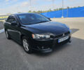 Чорний Міцубісі Lancer, об'ємом двигуна 2 л та пробігом 249 тис. км за 6500 $, фото 1 на Automoto.ua