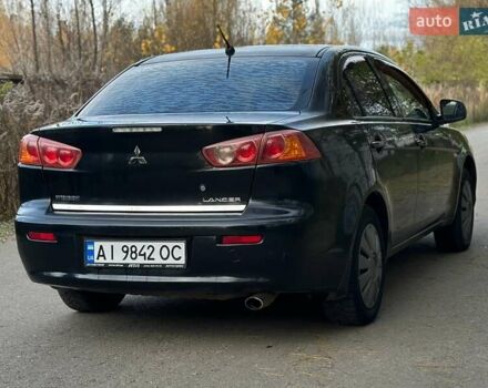 Черный Мицубиси Лансер, объемом двигателя 1.5 л и пробегом 285 тыс. км за 4800 $, фото 6 на Automoto.ua