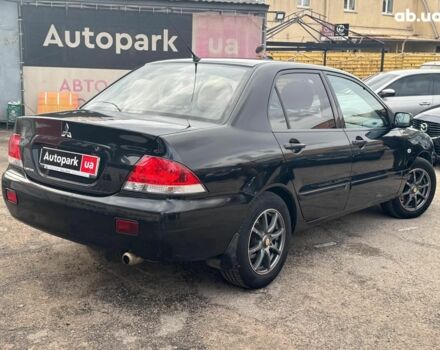 Мицубиси Лансер 2008 в Запорожье на Automoto.ua Черный Мицубиси Лансер, объемом двигателя 1.6 л и пробегом 316 тыс. км за 4290 $, фото 6 на Automoto.ua