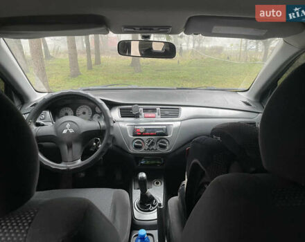 Черный Мицубиси Лансер, объемом двигателя 1.58 л и пробегом 214 тыс. км за 4400 $, фото 20 на Automoto.ua