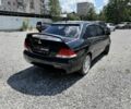 Чорний Міцубісі Lancer, об'ємом двигуна 1.6 л та пробігом 240 тис. км за 3252 $, фото 1 на Automoto.ua