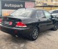 Мицубиси Лансер 2008 в Запорожье на Automoto.ua Черный Мицубиси Лансер, объемом двигателя 1.6 л и пробегом 316 тыс. км за 4290 $, фото 6 на Automoto.ua