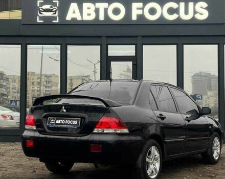Чорний Міцубісі Lancer, об'ємом двигуна 0 л та пробігом 340 тис. км за 6190 $, фото 7 на Automoto.ua