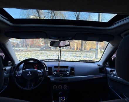 Черный Мицубиси Лансер, объемом двигателя 2 л и пробегом 236 тыс. км за 6550 $, фото 6 на Automoto.ua