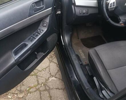 Черный Мицубиси Лансер, объемом двигателя 2 л и пробегом 192 тыс. км за 6350 $, фото 15 на Automoto.ua