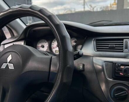 Чорний Міцубісі Lancer, об'ємом двигуна 1.6 л та пробігом 310 тис. км за 3500 $, фото 21 на Automoto.ua