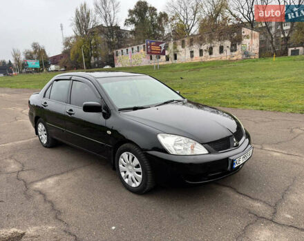 Чорний Міцубісі Lancer, об'ємом двигуна 1.6 л та пробігом 200 тис. км за 4500 $, фото 5 на Automoto.ua