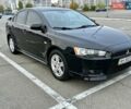 Чорний Міцубісі Lancer, об'ємом двигуна 2 л та пробігом 199 тис. км за 7900 $, фото 1 на Automoto.ua