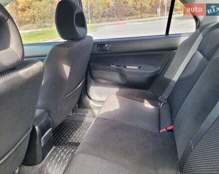 Міцубісі Lancer 2008 у Тернополі на Automoto.ua Чорний Міцубісі Lancer, об'ємом двигуна 1.58 л та пробігом 182 тис. км за 5600 $, фото 19 на Automoto.ua