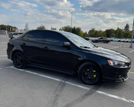 Черный Мицубиси Лансер, объемом двигателя 2 л и пробегом 297 тыс. км за 7500 $, фото 2 на Automoto.ua