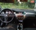 Черный Мицубиси Лансер, объемом двигателя 1.58 л и пробегом 217 тыс. км за 4900 $, фото 11 на Automoto.ua