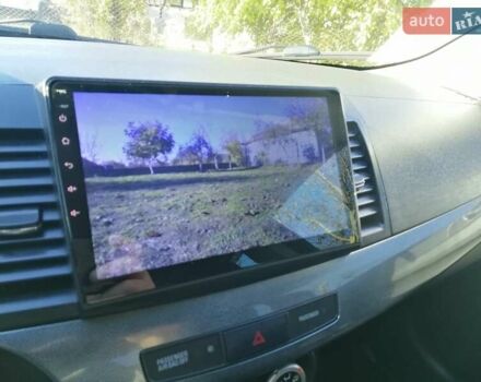 Мицубиси Лансер 2008 в Киеве на Automoto.ua Черный Мицубиси Лансер, объемом двигателя 2 л и пробегом 196 тыс. км за 5500 $, фото 16 на Automoto.ua