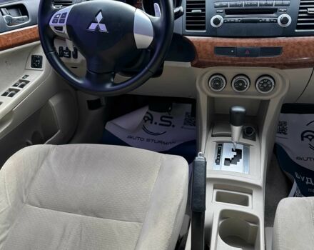 Чорний Міцубісі Lancer, об'ємом двигуна 2 л та пробігом 239 тис. км за 6900 $, фото 5 на Automoto.ua