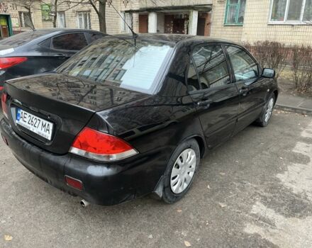 Чорний Міцубісі Lancer, об'ємом двигуна 1.6 л та пробігом 250 тис. км за 3900 $, фото 3 на Automoto.ua