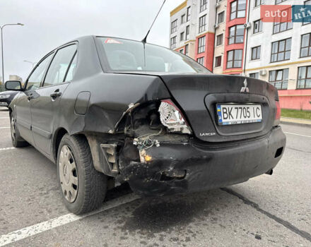 Чорний Міцубісі Lancer, об'ємом двигуна 1.58 л та пробігом 388 тис. км за 2300 $, фото 6 на Automoto.ua