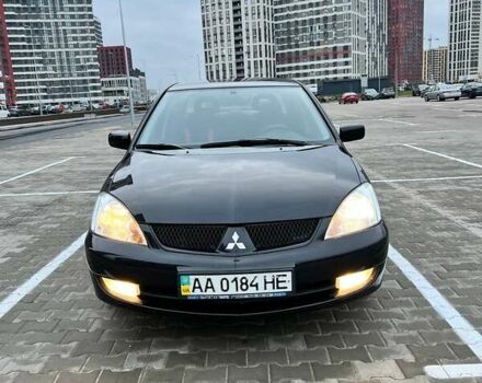 Чорний Міцубісі Lancer, об'ємом двигуна 1.6 л та пробігом 300 тис. км за 5500 $, фото 13 на Automoto.ua
