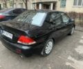 Чорний Міцубісі Lancer, об'ємом двигуна 1.6 л та пробігом 250 тис. км за 3900 $, фото 3 на Automoto.ua