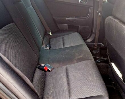 Чорний Міцубісі Lancer, об'ємом двигуна 2 л та пробігом 177 тис. км за 7000 $, фото 3 на Automoto.ua