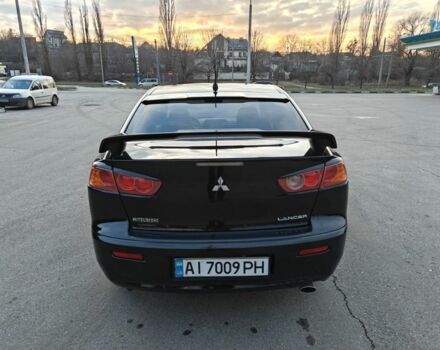 Черный Мицубиси Лансер, объемом двигателя 2 л и пробегом 245 тыс. км за 5600 $, фото 2 на Automoto.ua
