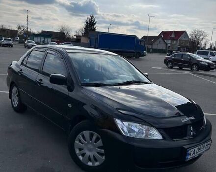 Чорний Міцубісі Lancer, об'ємом двигуна 1.6 л та пробігом 310 тис. км за 3500 $, фото 30 на Automoto.ua