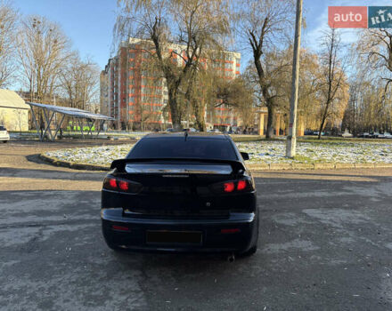 Черный Мицубиси Лансер, объемом двигателя 2 л и пробегом 236 тыс. км за 6450 $, фото 5 на Automoto.ua