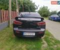 Чорний Міцубісі Lancer, об'ємом двигуна 2 л та пробігом 183 тис. км за 5000 $, фото 4 на Automoto.ua