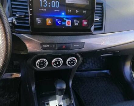 Мицубиси Лансер 2008 в Киеве на Automoto.ua Черный Мицубиси Лансер, объемом двигателя 2 л и пробегом 196 тыс. км за 5500 $, фото 11 на Automoto.ua