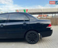 Чорний Міцубісі Lancer, об'ємом двигуна 1.58 л та пробігом 237 тис. км за 4500 $, фото 4 на Automoto.ua