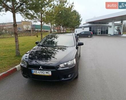 Черный Мицубиси Лансер, объемом двигателя 2 л и пробегом 200 тыс. км за 5100 $, фото 19 на Automoto.ua