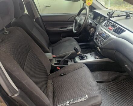 Черный Мицубиси Лансер, объемом двигателя 1.6 л и пробегом 243 тыс. км за 2900 $, фото 3 на Automoto.ua