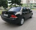 Чорний Міцубісі Lancer, об'ємом двигуна 1.6 л та пробігом 186 тис. км за 5700 $, фото 1 на Automoto.ua