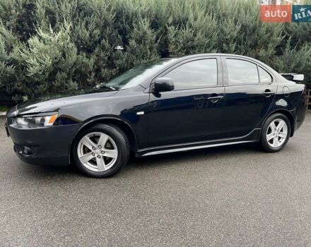 Чорний Міцубісі Lancer, об'ємом двигуна 2 л та пробігом 217 тис. км за 5600 $, фото 4 на Automoto.ua