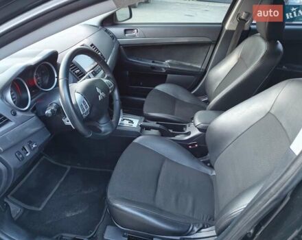 Черный Мицубиси Лансер, объемом двигателя 2 л и пробегом 245 тыс. км за 5600 $, фото 7 на Automoto.ua