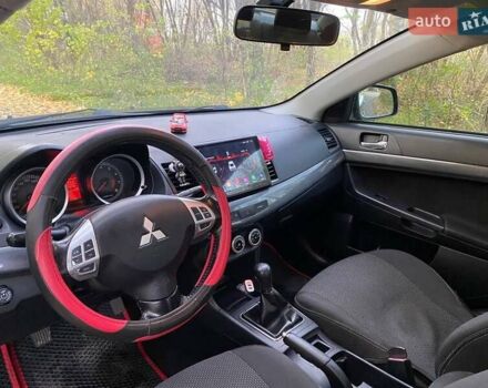 Чорний Міцубісі Lancer, об'ємом двигуна 2 л та пробігом 237 тис. км за 7500 $, фото 14 на Automoto.ua