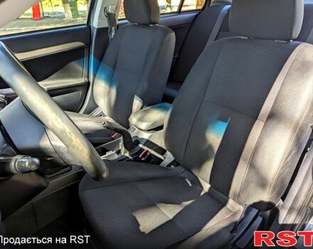 Черный Мицубиси Лансер, объемом двигателя 1.5 л и пробегом 235 тыс. км за 5250 $, фото 7 на Automoto.ua