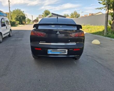 Чорний Міцубісі Lancer, об'ємом двигуна 2 л та пробігом 230 тис. км за 6650 $, фото 5 на Automoto.ua