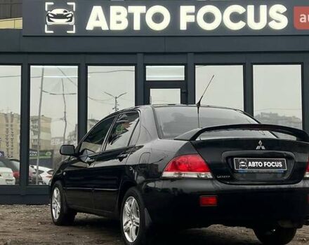 Чорний Міцубісі Lancer, об'ємом двигуна 1.6 л та пробігом 340 тис. км за 6190 $, фото 4 на Automoto.ua