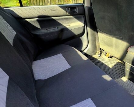 Черный Мицубиси Лансер, объемом двигателя 1.6 л и пробегом 232 тыс. км за 4400 $, фото 5 на Automoto.ua