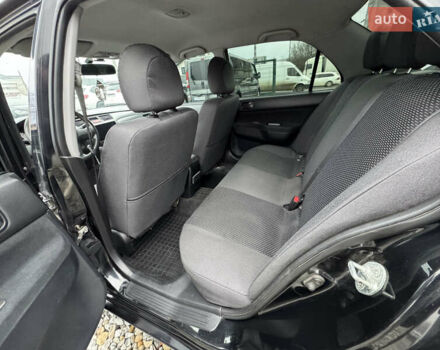 Черный Мицубиси Лансер, объемом двигателя 1.58 л и пробегом 202 тыс. км за 4100 $, фото 11 на Automoto.ua