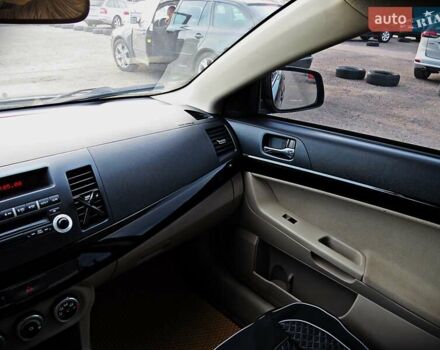 Мицубиси Лансер 2008 в Черкассах на Automoto.ua Черный Мицубиси Лансер, объемом двигателя 2 л и пробегом 178 тыс. км за 7400 $, фото 12 на Automoto.ua