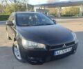 Черный Мицубиси Лансер, объемом двигателя 1.5 л и пробегом 300 тыс. км за 7100 $, фото 1 на Automoto.ua
