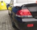 Черный Мицубиси Лансер, объемом двигателя 1.58 л и пробегом 139 тыс. км за 5200 $, фото 8 на Automoto.ua