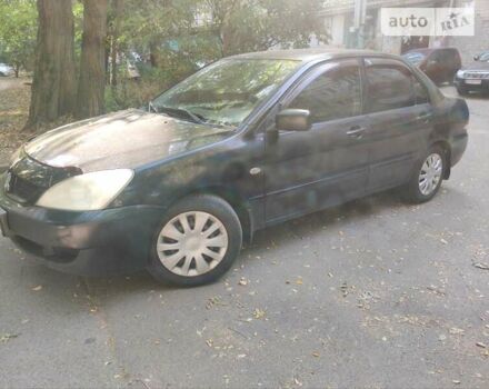 Чорний Міцубісі Lancer, об'ємом двигуна 1.6 л та пробігом 335 тис. км за 3100 $, фото 8 на Automoto.ua