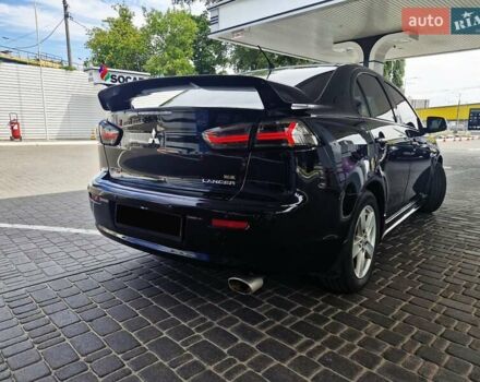 Чорний Міцубісі Lancer, об'ємом двигуна 2 л та пробігом 240 тис. км за 7850 $, фото 22 на Automoto.ua