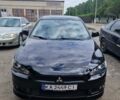 Черный Мицубиси Лансер, объемом двигателя 2 л и пробегом 178 тыс. км за 7000 $, фото 1 на Automoto.ua